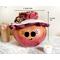 This is a fall apple decoration. It is a real gourd with a happy face  carved into it. This gourd is named Apple and  8x 8 inches.